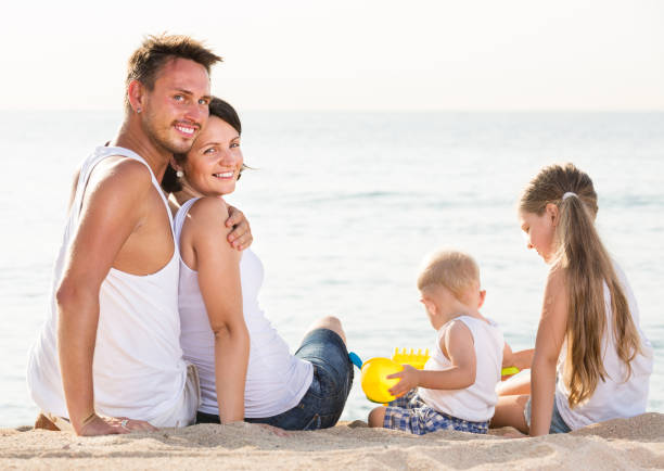 istock Happy family and kids sitting with back forward 838672786