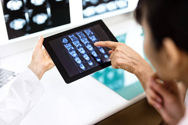 istock Doctor and patient using digital tablet in hospital 838723682