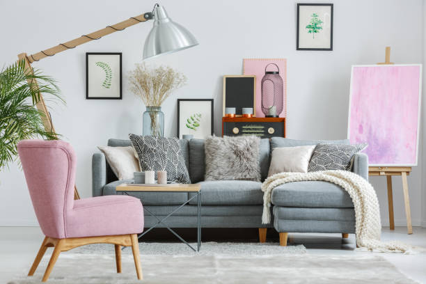 istock Pink armchair on grey carpet 838725204