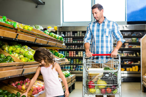 istock Father and daughter doing shopping 838725492