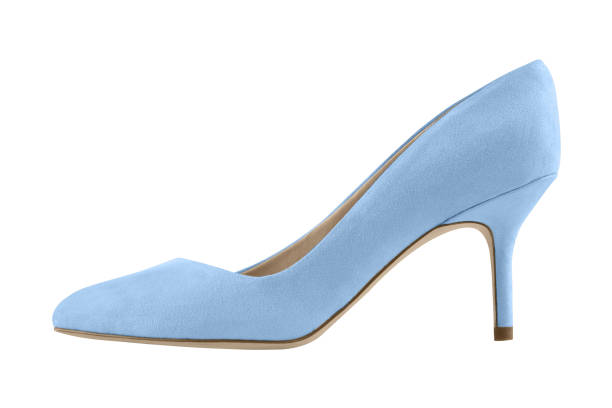 Pale cyan blue suede spike high heels shoe isolated on white Pale cyan blue suede spike high heels shoe isolated on white spiked photos stock pictures, royalty-free photos & images