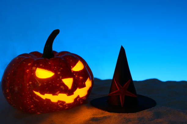 istock Creepy pumpkin on sandy beach 838740670