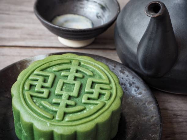 istock Green tea festival moon cake with tea pot 838769612