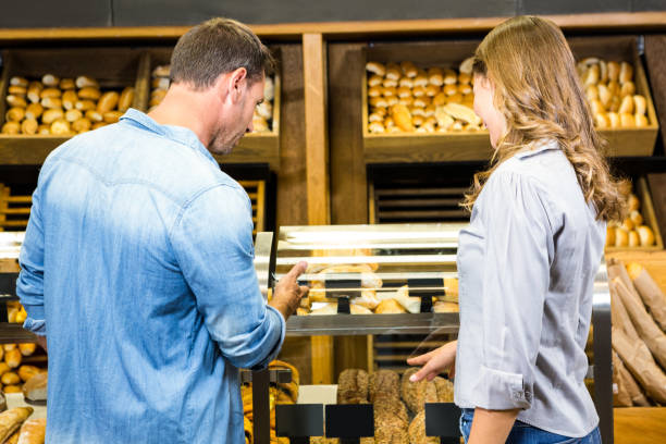 istock Happy couple looking at bread 838769632