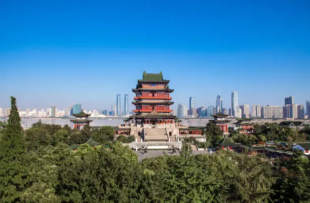 Photo of Chinese ancient buildings and modern architecture coexist