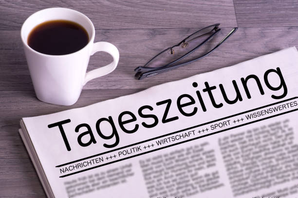 istock Cup of coffee and a newspaper 838789366