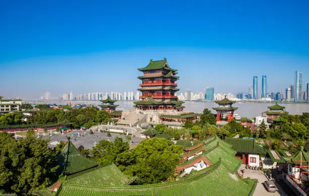 Photo of Chinese ancient buildings and modern architecture coexist