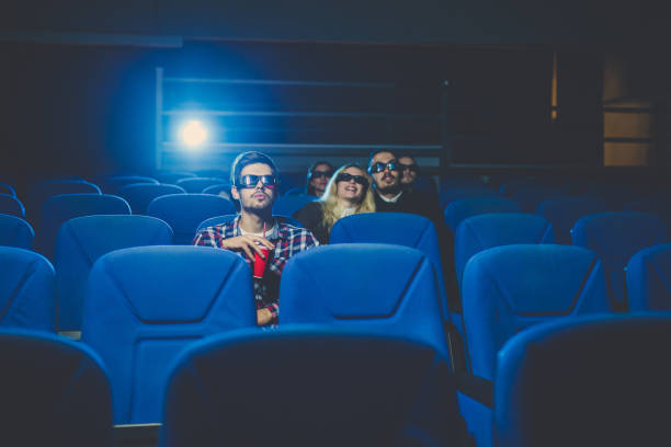 istock Couple watching a movie in the back 838801702