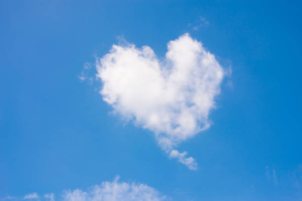 istock Blue sky with heart shape clouds. Valentine concept. 838810664