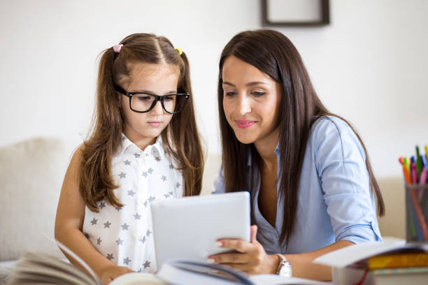 istock Mother Helping Daughter With Homework 838814904