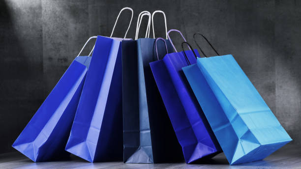 istock Composition with blue paper shopping bags 838816124