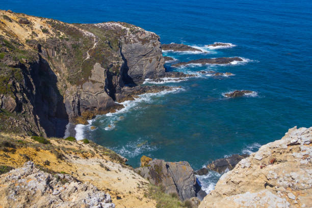 istock Wave and cliffs in the Beach in Almograve 838816160