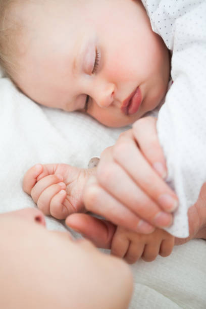 istock Peaceful little baby sleeping with her mother 838825608