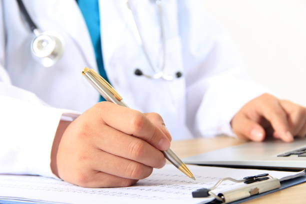 istock Female doctor writing on a clipboard 838829776