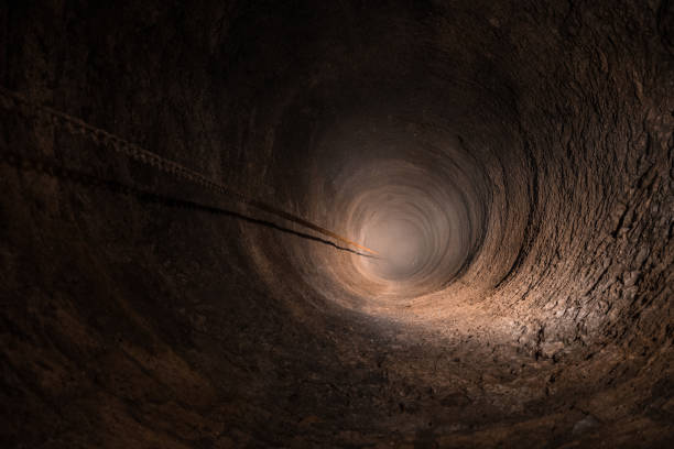 istock The hole of an ancient stone well 838829986