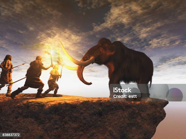 Prehistoric Men Hunting A Young Mammoth Stock Photo - Download Image Now - Neanderthal, Hunting - Sport, Prehistoric Era