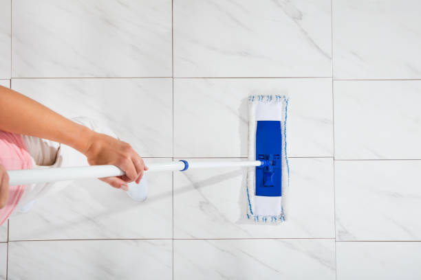 istock Woman Mopping The Floor 838837384