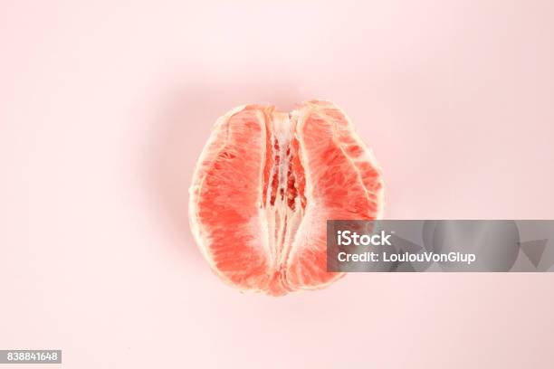Half Peeled Grapefruit Stock Photo - Download Image Now - Grapefruit, Fruit, Sensuality
