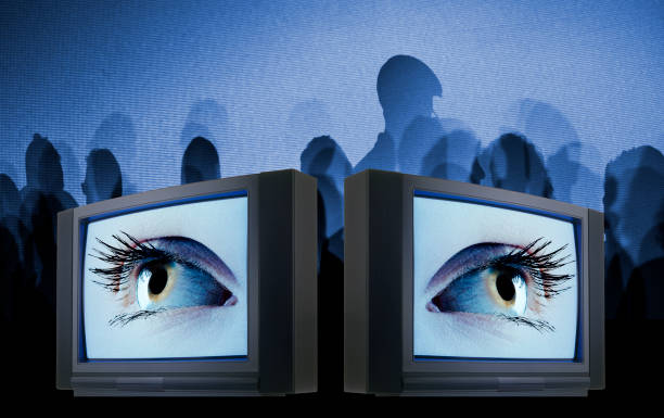 istock Old fashioned television with eyes against matrix screen 838845660
