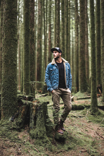 istock solitude traveler walking into the wood 838856904