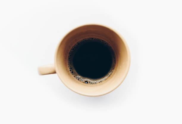 istock Top view a cup of coffee on white background, isolated 838875234