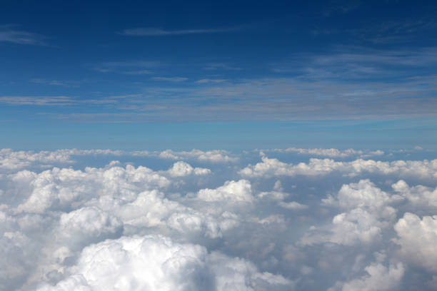 istock Blue sky and white clouds view from the airplane window 838880300