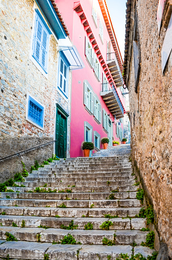 Narrow stone street and buildings in Nafplion city. Greece