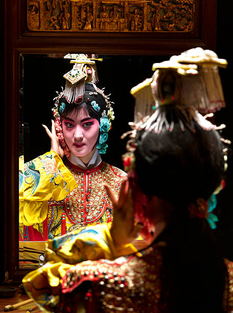 Chinese opera character looking in mirror (Yu Ji)  chinese opera makeup stock pictures, royalty-free photos & images