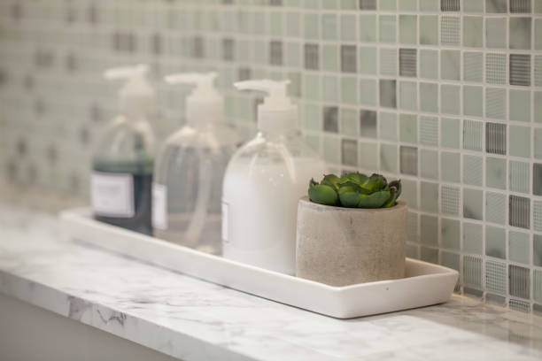 istock Liquid soap bottle with tile background Bathroom accessories. 838898960