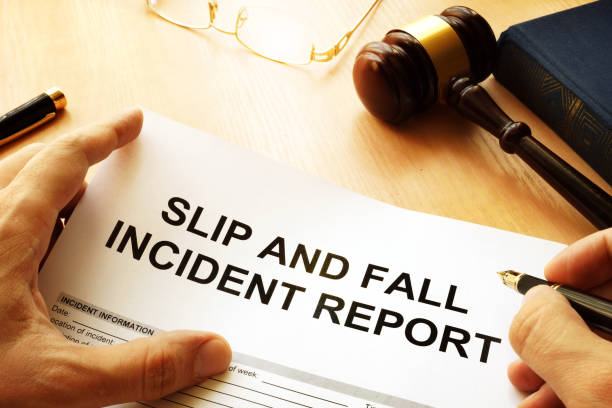 Slip and fall injury report on a table. Slip and fall injury report on a table. slippery stock pictures, royalty-free photos & images