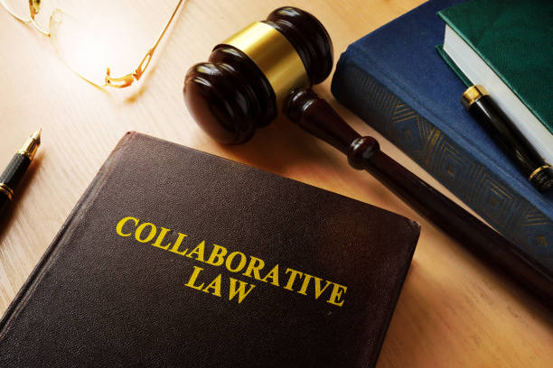 istock Collaborative law on a desk and gavel. 838905832