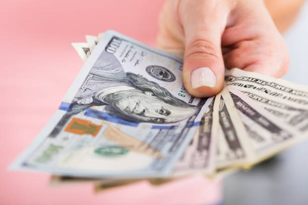 istock Person Hand Showing Dollar Currency 838906066