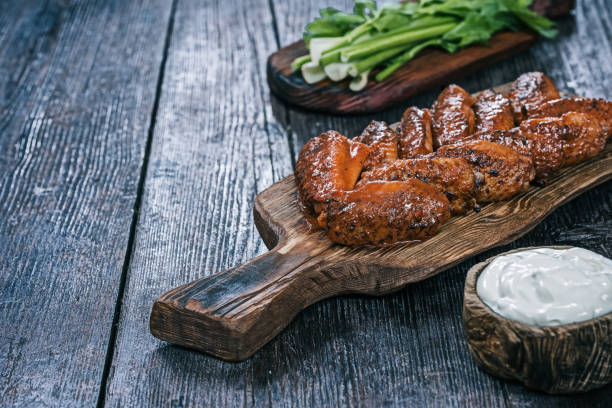 istock Buffalo wings served on wood 838906258