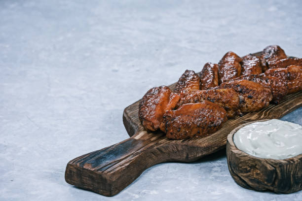 istock Buffalo wings served on wood 838909452