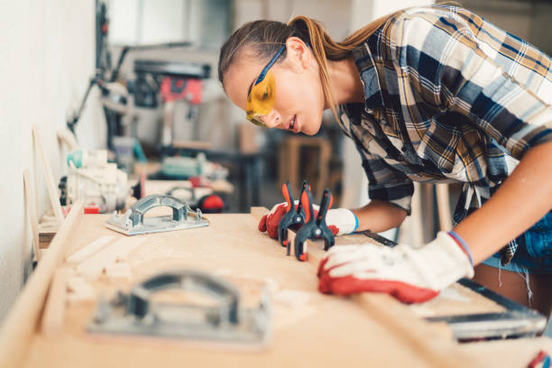 istock Craftswoman in the carpentry workshop 838909564