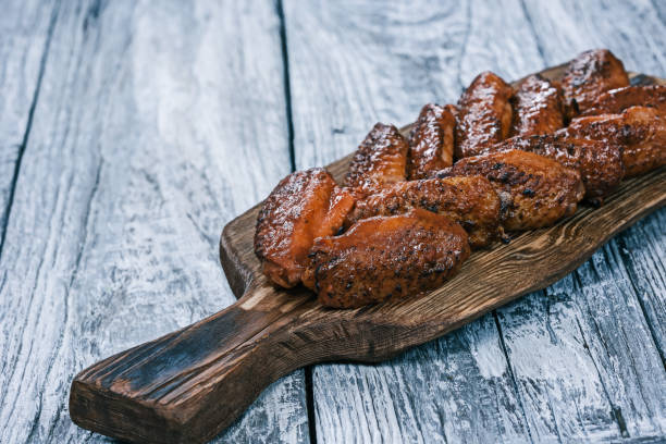 istock Buffalo wings served on wood 838910036