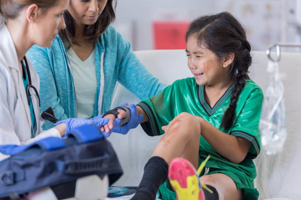 istock Upset injured elementary age soccer player visits emergency room 838910384