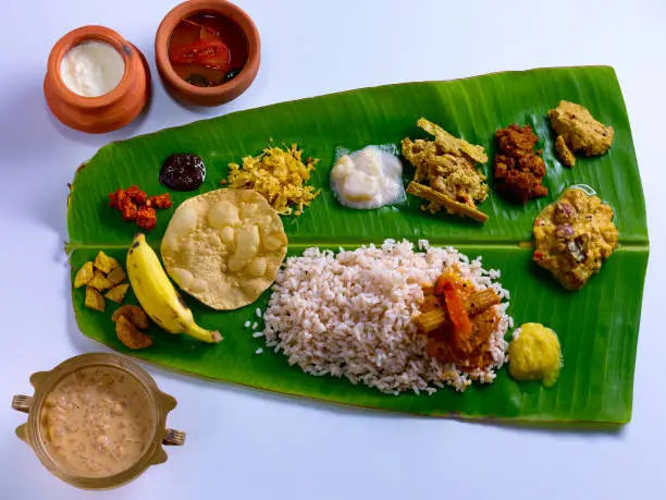 Traditional Onam sadya served in banana leaf