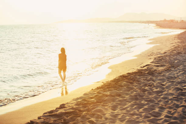 istock Relaxed woman enjoying sun 838941648