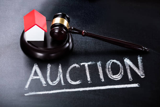 istock House Model With Gavel On Blackboard 838949720