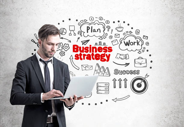 istock Bearded businessman with laptop, strategy 838952630