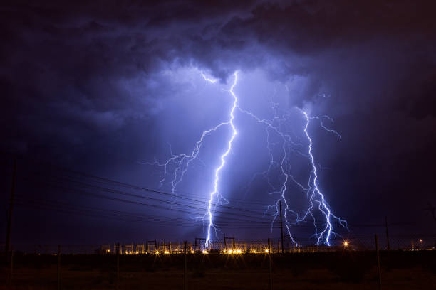 Lightning Lightning strikes an electrical substation in the city of Phoenix. lightning storm natural disaster cloud stock pictures, royalty-free photos & images