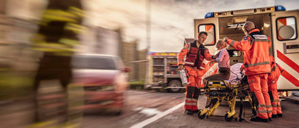 istock Paramedics helping injured woman 838962944