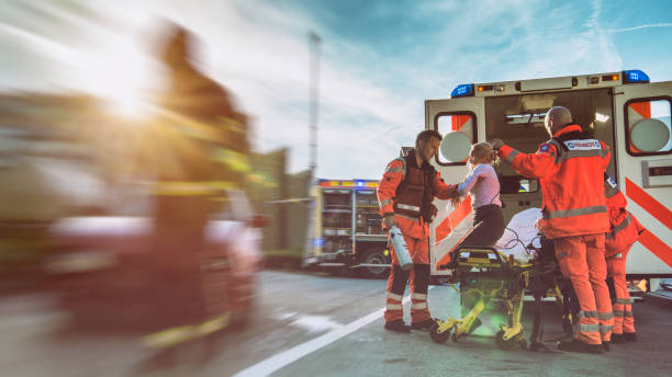 istock Paramedics helping injured woman 838963102