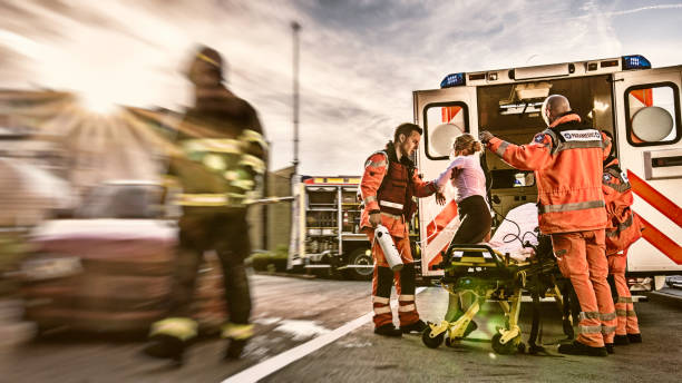 istock Paramedics helping injured woman 838963152