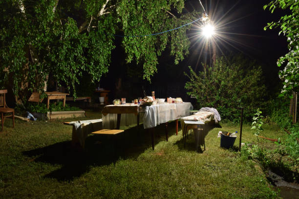 istock Table at night in the yard under a bright lamp 838963328