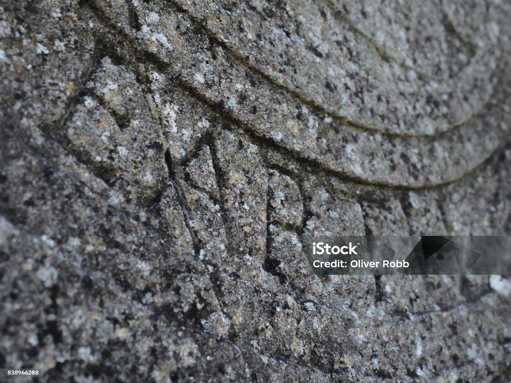 Earth engravement The word Earth engraved on a flat rock surface. Engraved Image Stock Photo