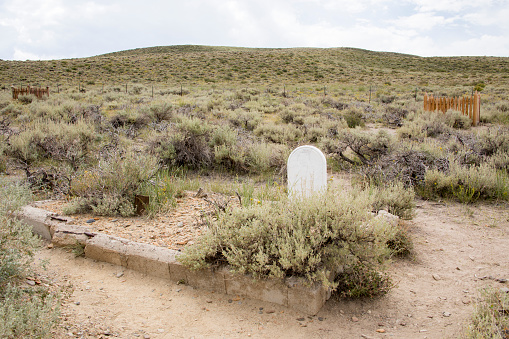 Marble headstone on grave in cemetery in Bodie State Historic Park,