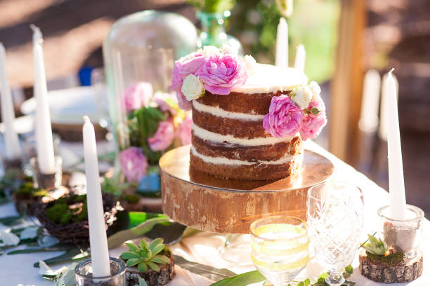istock Puffy wedding cake with flowers 838979848