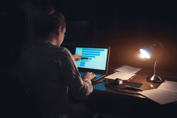 istock Businesswoman working late night 838986116